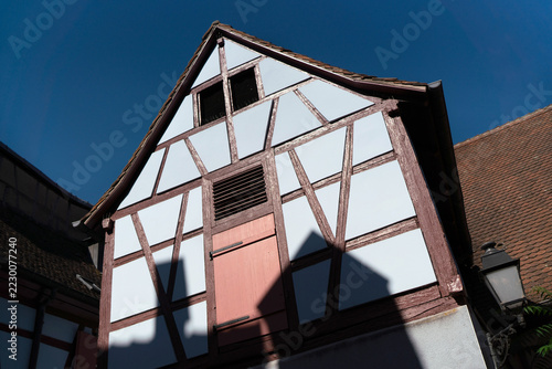 A close-up of the roofs and the typical half-timbered architecture of the houses in Colamr, Alsace 