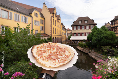 Tarte flambée to eat in or take out, on the bridge in “Little Venice” in Colmar, Alsace, France