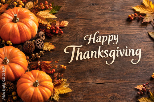 Happy Thanksgiving with Mini Pumpkins and Autumn Leaves
