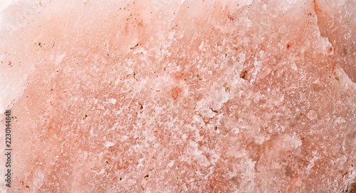 Himalayan pink salt crystal texture background, close-up macro
