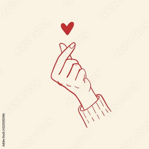 Hand-drawn red line art illustration of a hand in a knit sweater sleeve making the Korean finger heart gesture with floating red heart on cream background for Valentine and love greeting designs