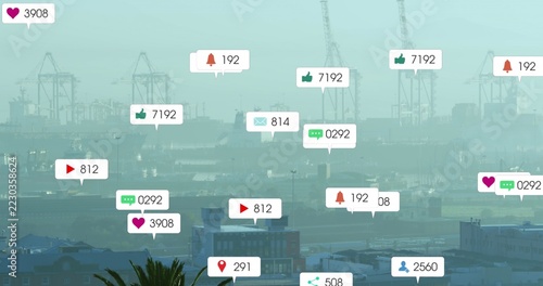 Floating cluster of notification badges overlaying coastal port skyline, with cranes rooftops palm