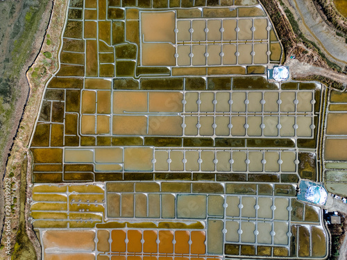 Obraz na plátně Aerial view of salt marshes and evaporation ponds in Guérande, France