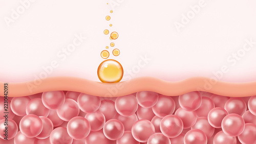 Amber liquid droplet rising from pink spheres under skin layer