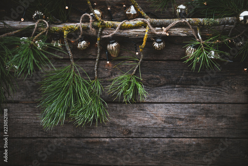 Horizontal background with rustic wood plank texture and christmas decoration. Top view with space for text and logo.