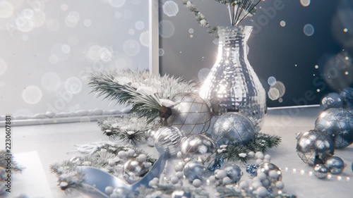 Sliding camera revealing silver ornaments on tabletop to show hammered vase and drifting particles