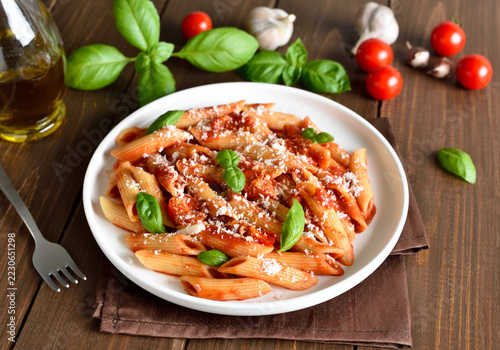 Italian penne pasta with tomato bolognese sauce