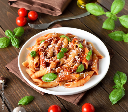 Italian penne pasta with tomato bolognese sauce