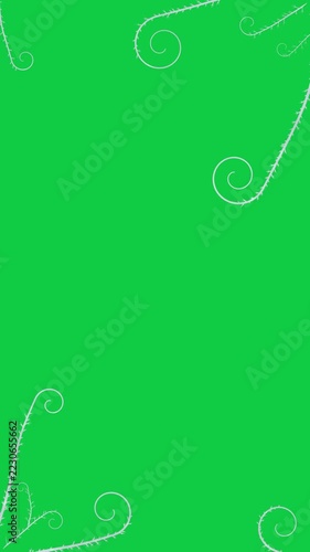 Vertical video: Frosted vines sliding and curling on loop, forming corner frame over transparent bg