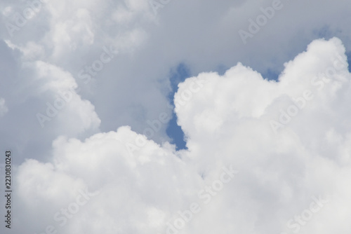 Close up of cumulus cloud. The clouds have flat bases and are often described as puffy, cotton like or fluffy in appearance