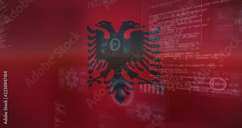 Displaying black double headed eagle emblem overlaying virtual studio backdrop, with HUD panels