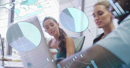 Image of illuminated infographic interface over diverse coworkers sharing ideas in office