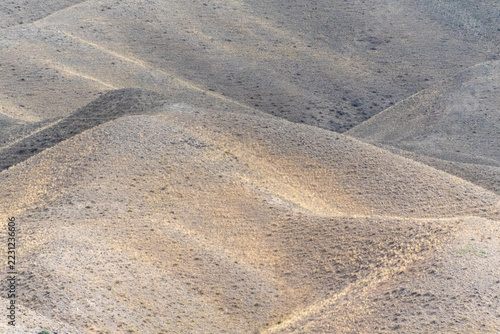 A barren desert landscape near the aktogay region in Southern Kazachstan, close to the Black Canyon