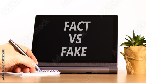 Obraz na plátně Fact vs versus fake words symbol