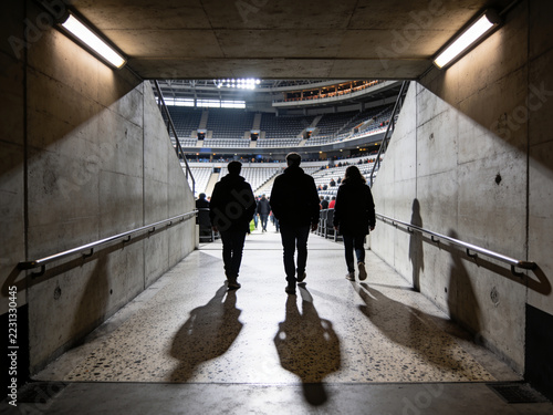Point of View from Dark Stadium Passage Toward Bright Seating Terraces