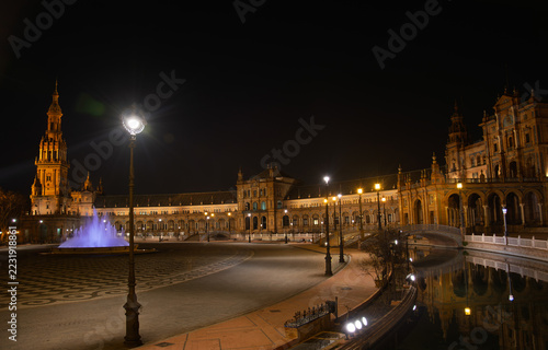 Warm lights and mysterious shadows blend between the monumental arches full of Andalusian history