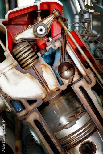 Close-Up Cross-Section of an Internal Combustion Engine Showing Piston, Valve and Mechanical Components