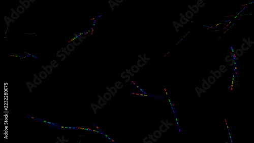 Abstract rainbow light streaks scattered across dark black background for digital art