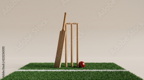 Cricket Bat, Stumps and Red Ball on Green Grass against a Beige Background with Copy Space