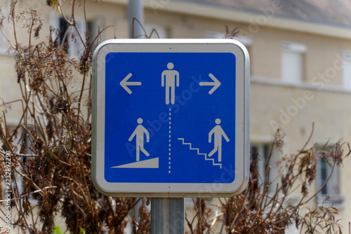 Blue and white pedestrian traffic sign at French city of Caen on a summer day. Photo taken July 17th, 2026, Caen, Normandie, Normandy, France.