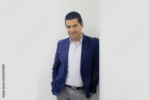 40-year-old Latino executive with a dark skin, successful leader of his business and finance venture
