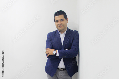 40-year-old Latino executive with a dark skin, successful leader of his business and finance venture
