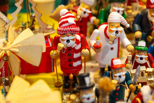 Colorful wooden nutcracker figurines displayed at a Christmas market in Salzburg, Austria.