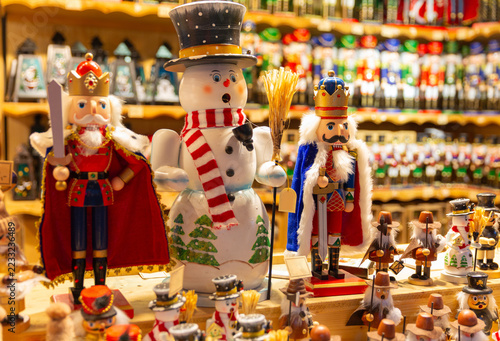 Colorful wooden nutcracker figurines displayed at a Christmas market in Salzburg, Austria.