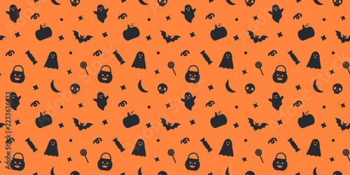 Orange Halloween seamless pattern for spooky autumn holiday background and wrapping paper