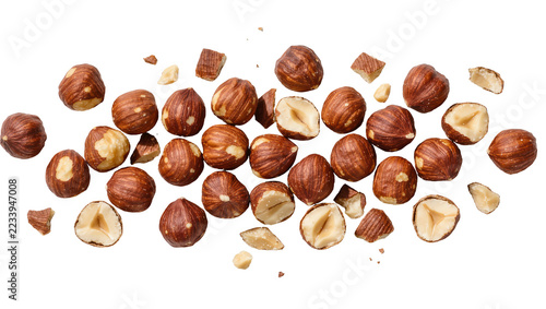 Fotografie Isolated roasted peeled hazelnuts, whole, split, and pieces, healthy crunchy snack ingredient