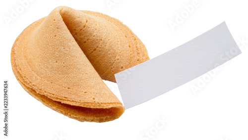 Isolated fresh baked golden fortune cookie with empty paper slip ready for a message