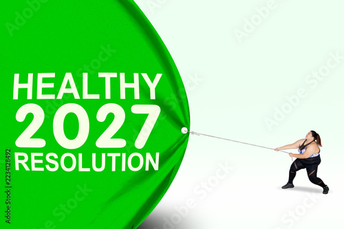 Woman Pulling Healthy 2027 Resolution Banner with Chain Concept