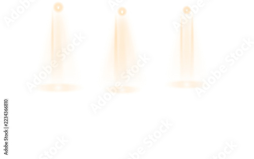 Three bright orange light beams shining down from above