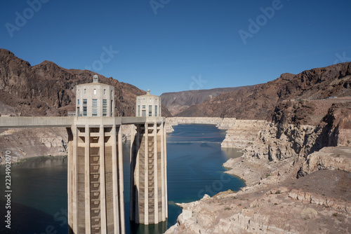 Hoover Dam Intake Towers with view of Lake Mead. Lake Mead was formed by creating a dam on the Colorado River at the boarder of Nevada and Arizona