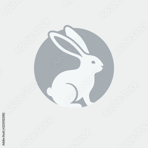 Minimalist rabbit silhouette logo design inside circular frame graphic isolated on light background