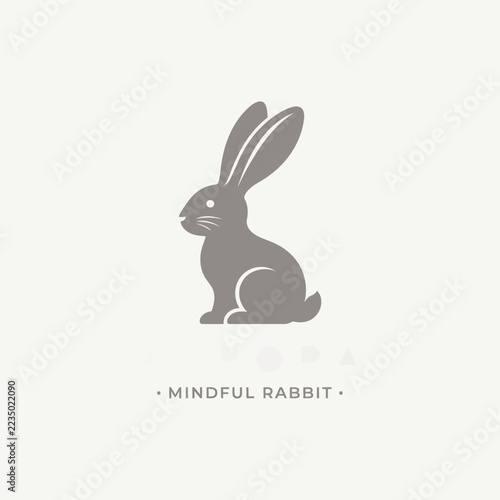 Elegant minimalist illustration of a tranquil grey rabbit, perfect for projects seeking a harmonious and serene natural aesthetic