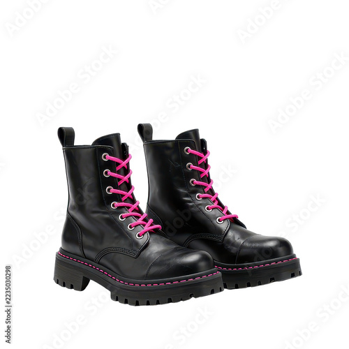 Black boots with pink laces isolated on black background