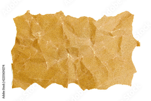 Torn Piece of Crumpled Brown Sandpaper Isolated