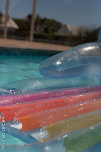 Inflatable tube floating in a swimming pool