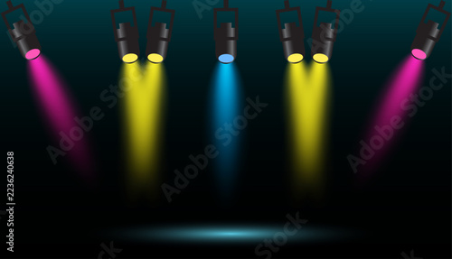 Vibrant colorful stage lighting beams creating a dramatic professional spot light effect for events