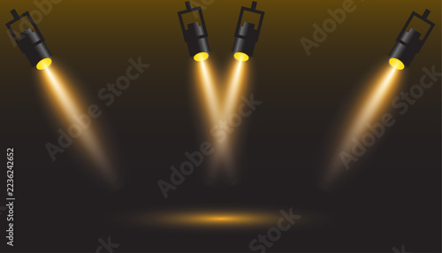 Bright golden stage lighting featuring a dramatic spot light effect on dark background texture