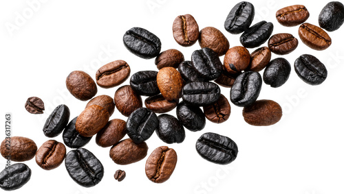Obraz na plátně Roasted dark and medium brown coffee beans scattered in a diagonal arrangement