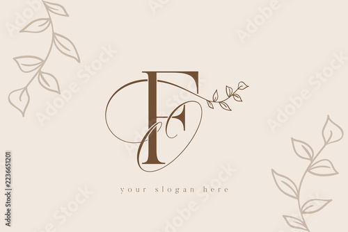FO letter monogram vector logo template adorned with hand drawn botanical foliage branches in brown tones