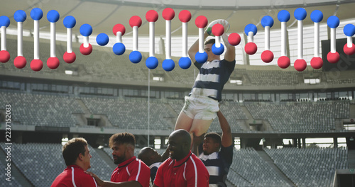 Composition of dna strand over diverse rugby players in sports stadium