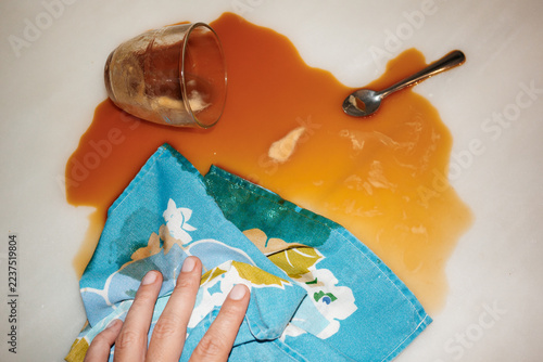 Cleaning Up a Spilled coffee on Table